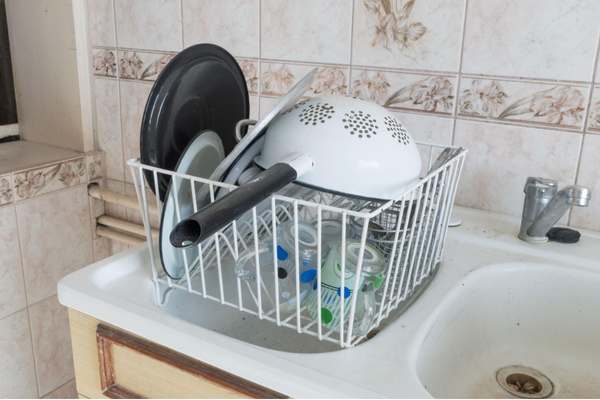Keep A Basket Around For Dirty Dish Towels