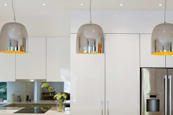 Statement Pendant Lights Modern White Kitchen With Black Countertops