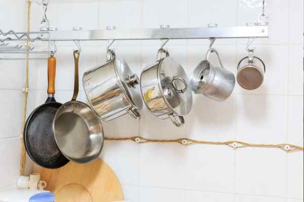 Hang Pots and Pans To Keep Kitchen Island Clutter-Free