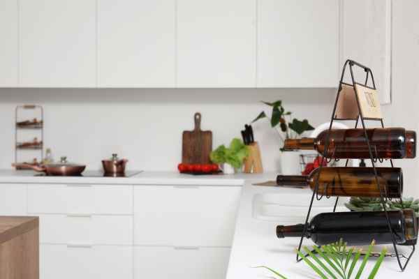 Wine Rack To Decorate A White Kitchen Counter