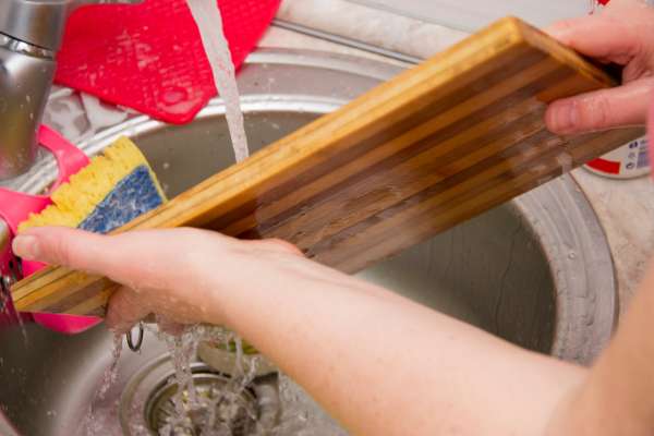 Rinse The Cutting Board With Water