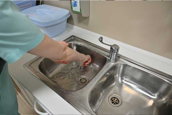 Rinse The Faucet With Water