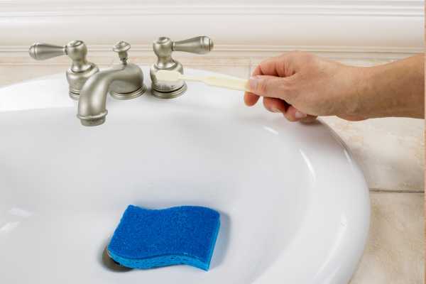 Scrub The Faucet With A Brush