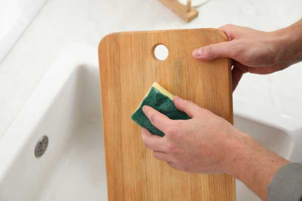 Soak The Brush in The Soap And Scrub The Cutting Board Again Clean Plastic Cutting Boards