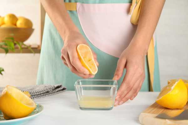 Squeeze Lemon Juice Into A Bowl
